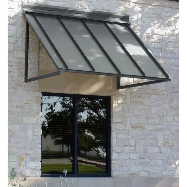 Awntech Houstonian standing seam metal fixed awning for residential and commercial use, offering durable weather protection.